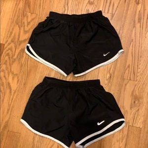 Two pairs of girls Nike athletic shorts